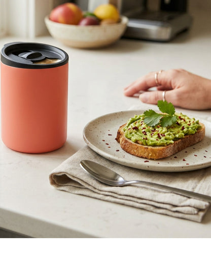 Ozkv Compact Insulated Travel Mug with Slider Lid 350 ml Coral - Lifestyle view